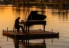 Moissac. Un piano flottera sur le Tarn pour la Fête de la musique Un piano installé sur une embarcation naviguant sur le Tarn lors d'un concert à Moissac.